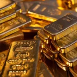 Після рекорду золото подешевшало через очікування зниження ставок ФРС